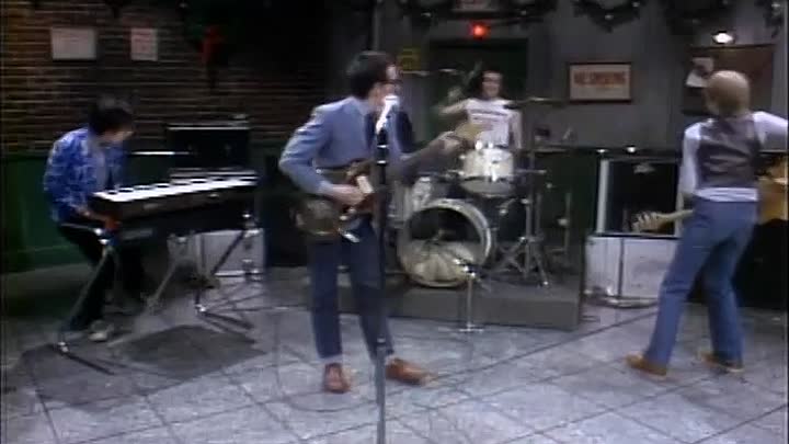 ⁣Elvis Costello and the Attractions play Radio Radio (which got him banned) From a Christmas episode