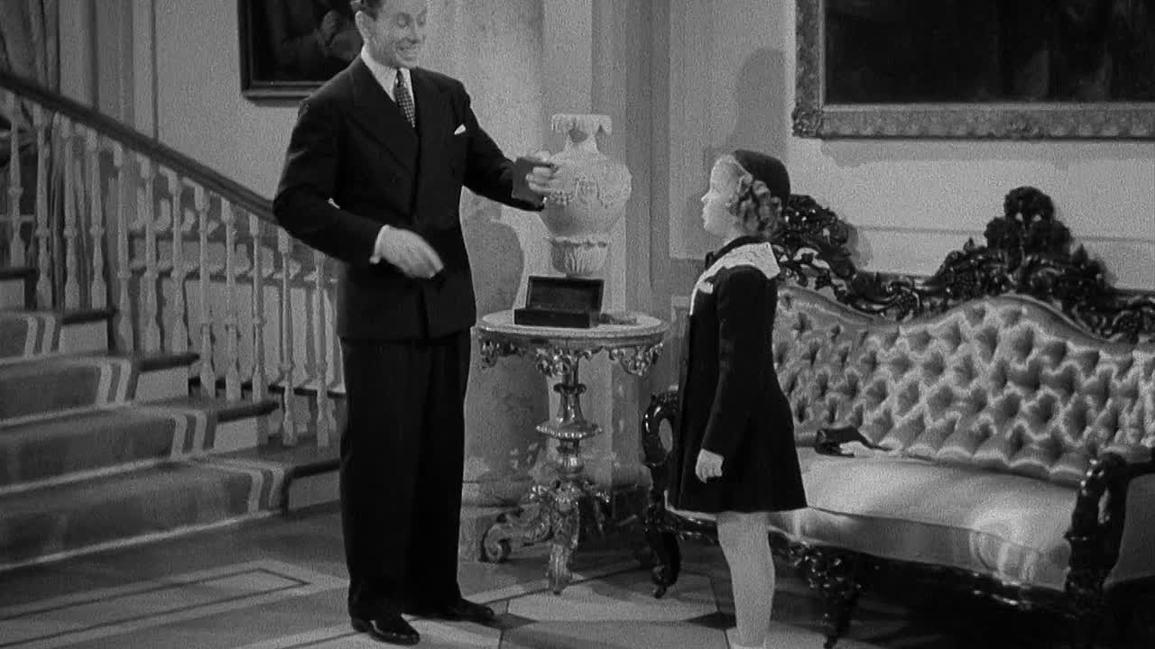 ⁣Little Miss Broadway 1938 1080p WEBRip x264 AAC-[YTS LT]